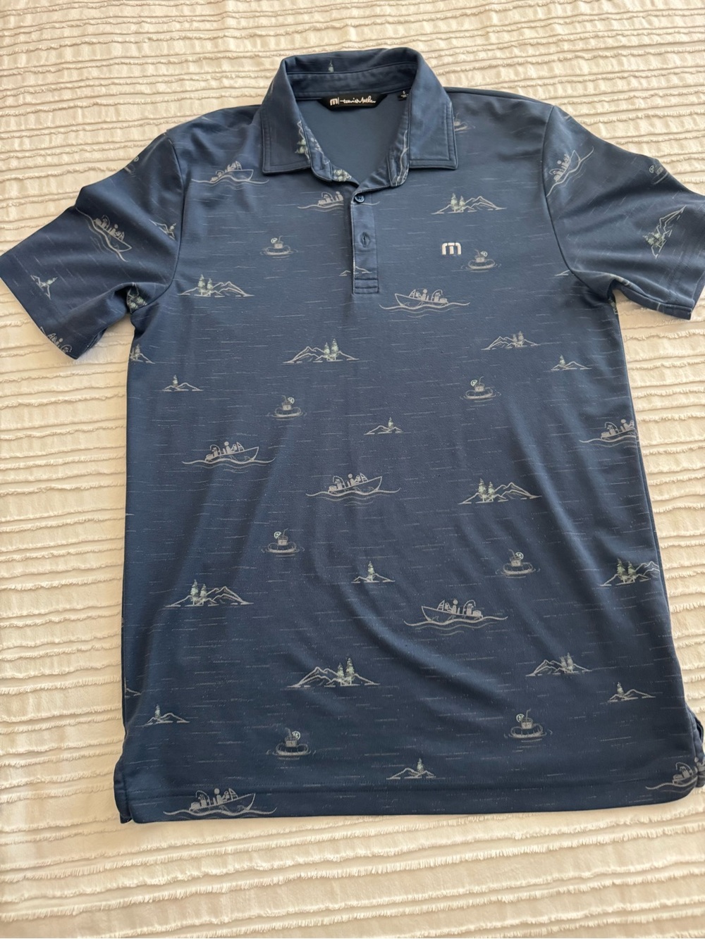 Travis Mathew Navy Polo with Light Blue Nautical Print